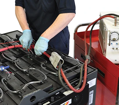 technician perform load testing of motive power battery