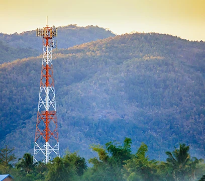 wireless cell tower with mountain background